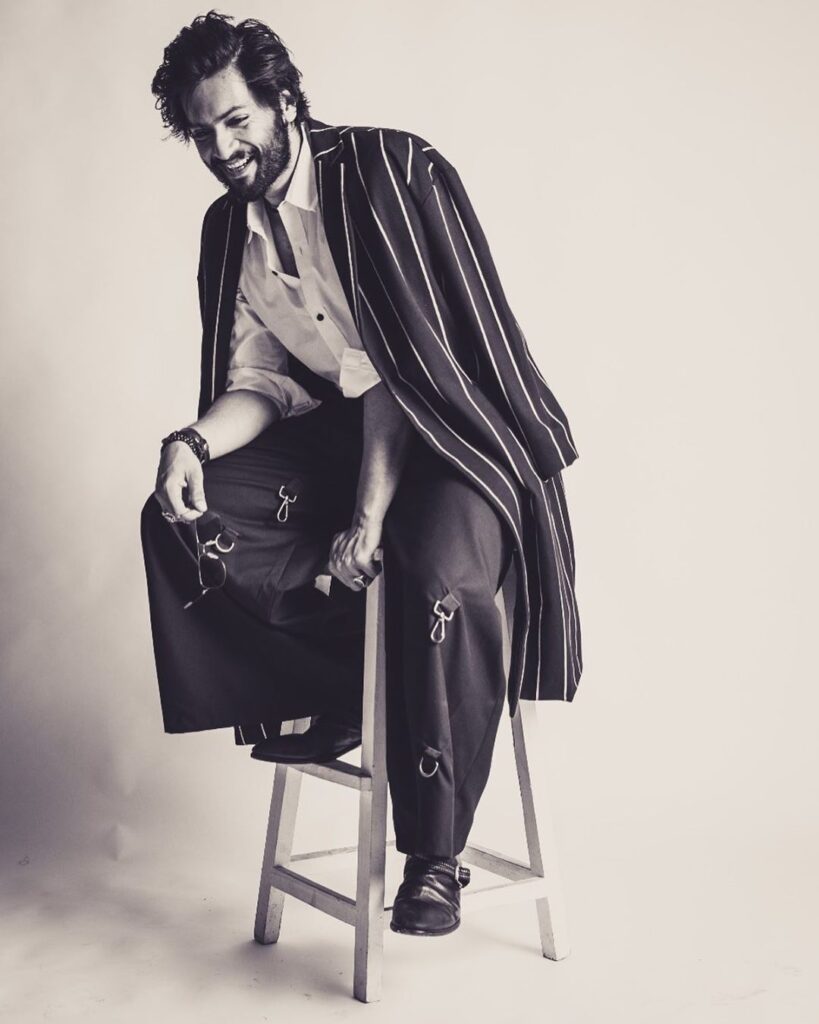 Top Male Model in India - Ali Faizal..Sitting on a stool posing