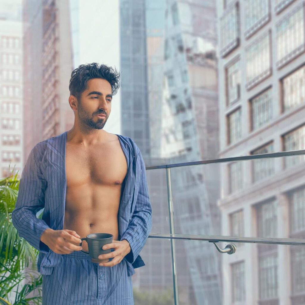 Ayushmann Khurrana top model India - posing open shirt button bare chest.