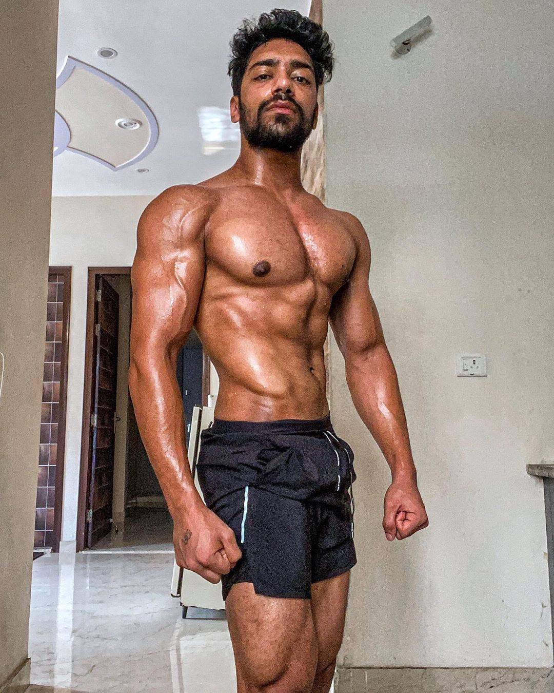 Rohit Khatri top model India - posing and flaunting his chest and abs