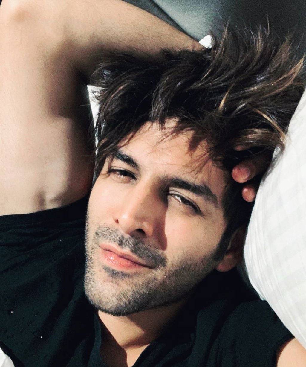 kartik Aryan Top Model India - lying down playing with hair