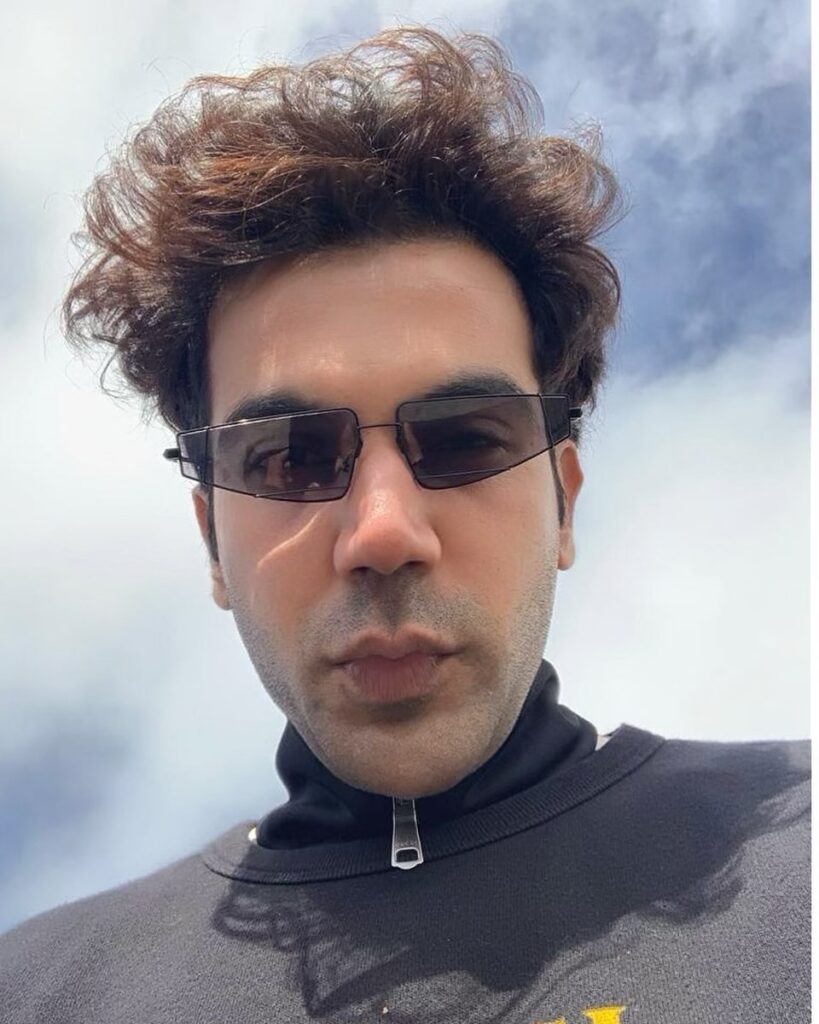 Rajkumar Rao hairstyle - selfie, wear black shades and rough hairstyle
