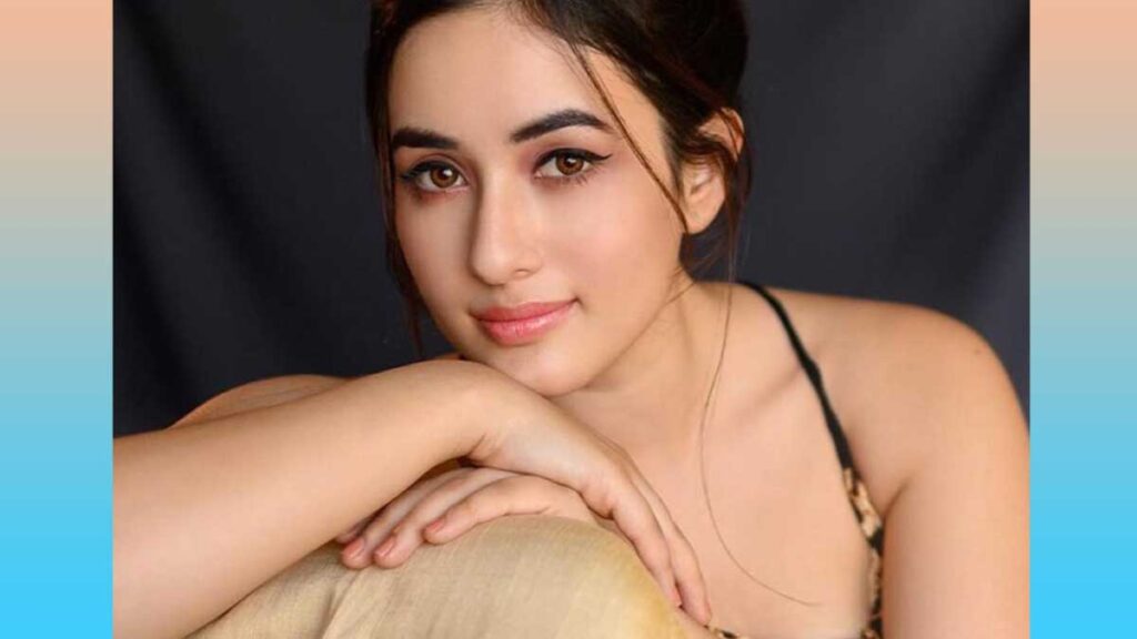 Aditi Budhathoki  - Sitting and Posing for camera in portrait photo