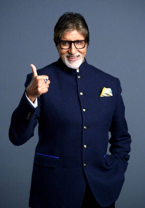 Amitabh Bachhan standing with thumsup pose