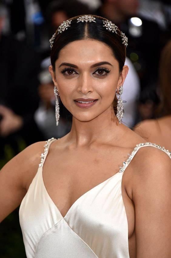 Deepika Padukone wearing gorgeous white dress