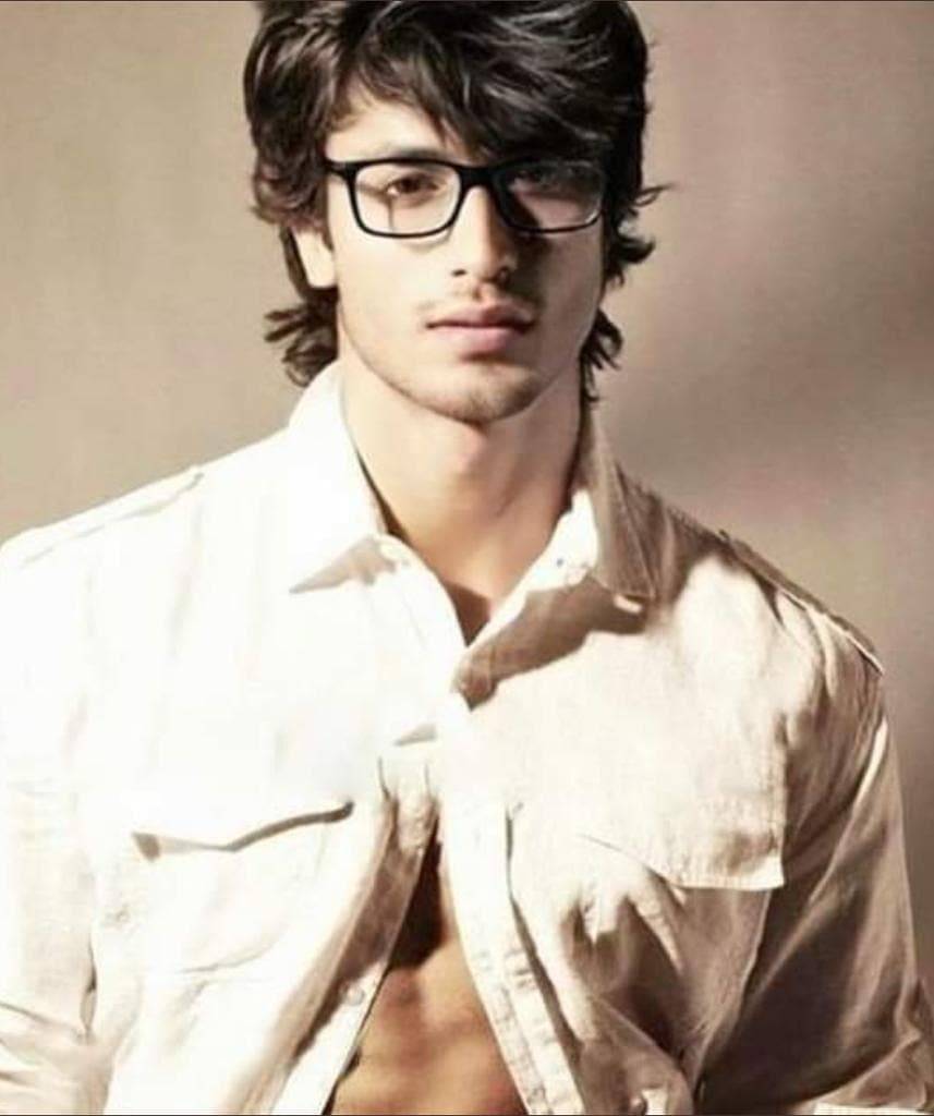 Vidyut in spectacles and white shirt with Messy Hair - mid length messy hair