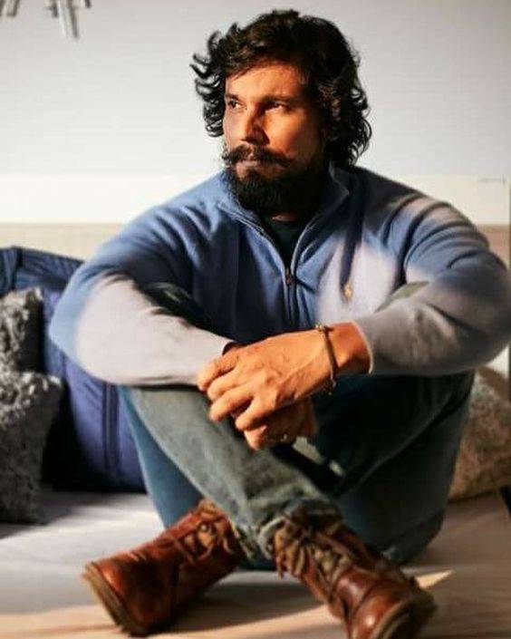 Randeep Hooda sitting on floor