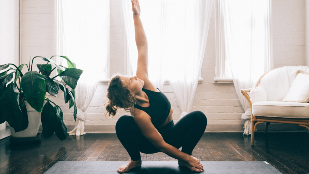 Sky Reaches - woman in her black activewear