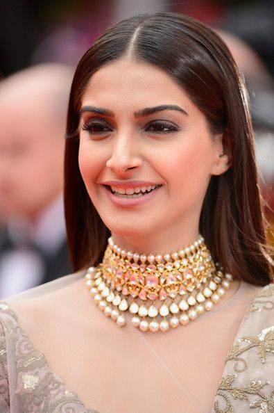 Sonam Kapoor wearing saree and smile on her face in Cann festival