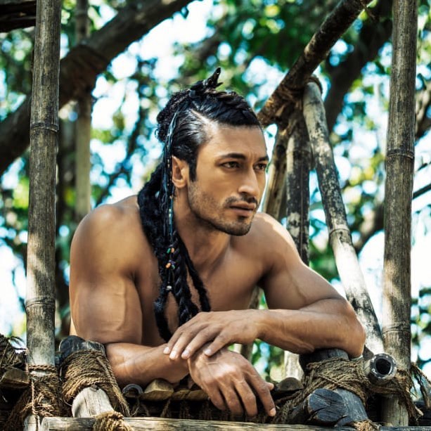 Shirtless Vidyut Posing with Tribal Braids -braid hairstyles for men