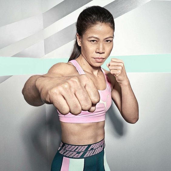 Mary Kom wearing sports outfit in punch pose