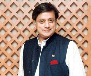 Shashi Tharoor wearing white kurta & black  basket