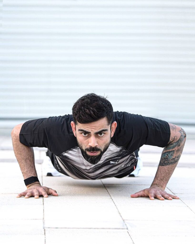 Short quiff hairstyle in pushup pose
