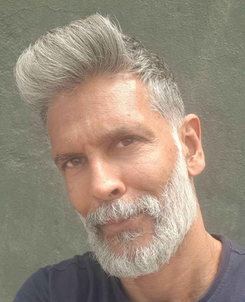 Milind Soman ruffled short and swept hairstyle