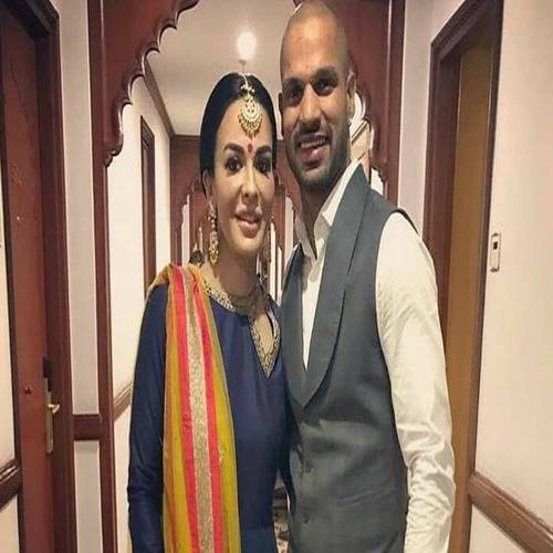 Shikhar Dhawan smiling and posing with ex-wife Aesha Mukherjee