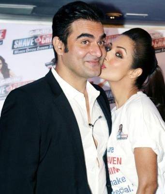 Malaika Arora kissing Arbaaz Khan - highest paid divorce in india