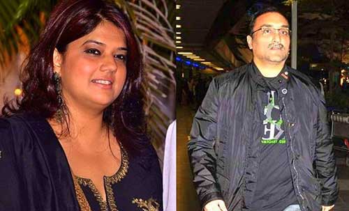 Aditya Chopra in grey jacket and Payal Khanna in blue suit - highest paid divorce in bollywood