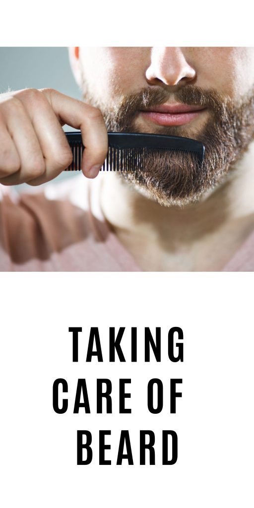 A man is combing his brown shaded beard - grow thick beard naturally