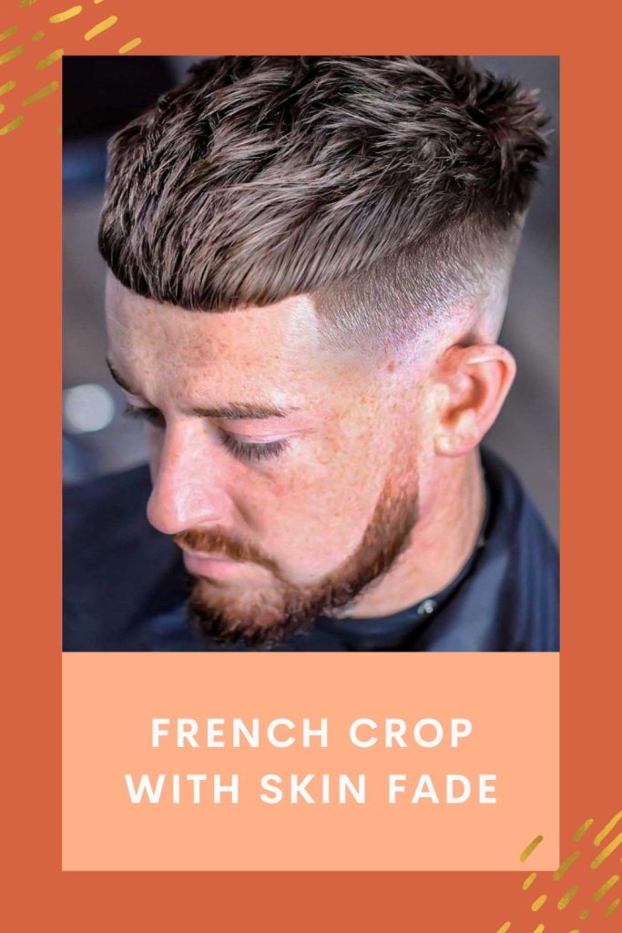 A guy looking down and posing for the camera in his French crop with skin fade look - short beard styles for older man