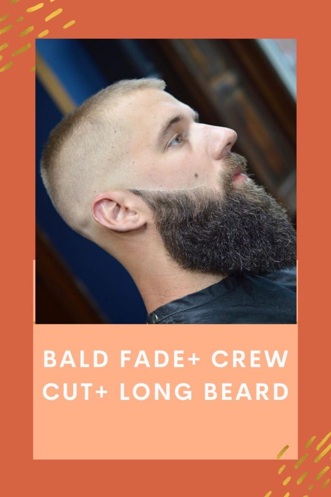 A man is giving a side pose and showing his Bald fade+ Crew cut+ Long Beard - full beard styles