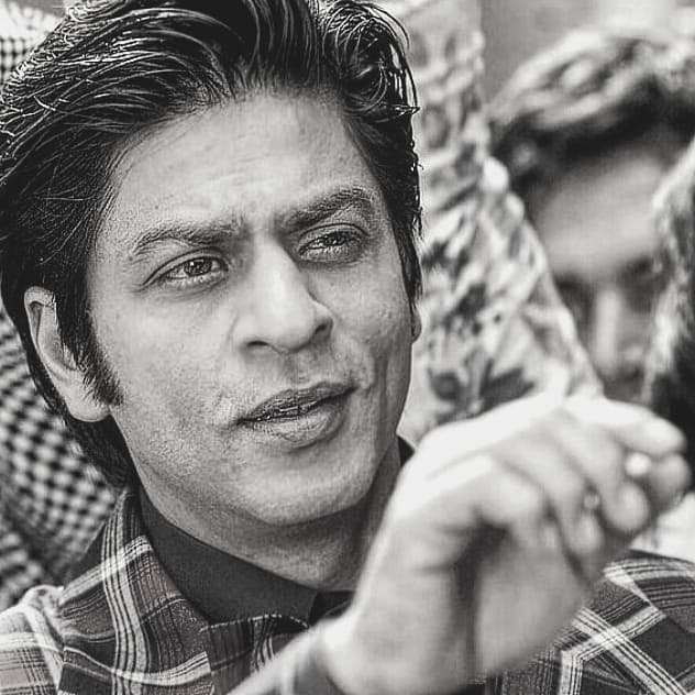 Shahrukh khan in a black and white photo showing his sideburns hairstyle - shahrukh khan hairstyles