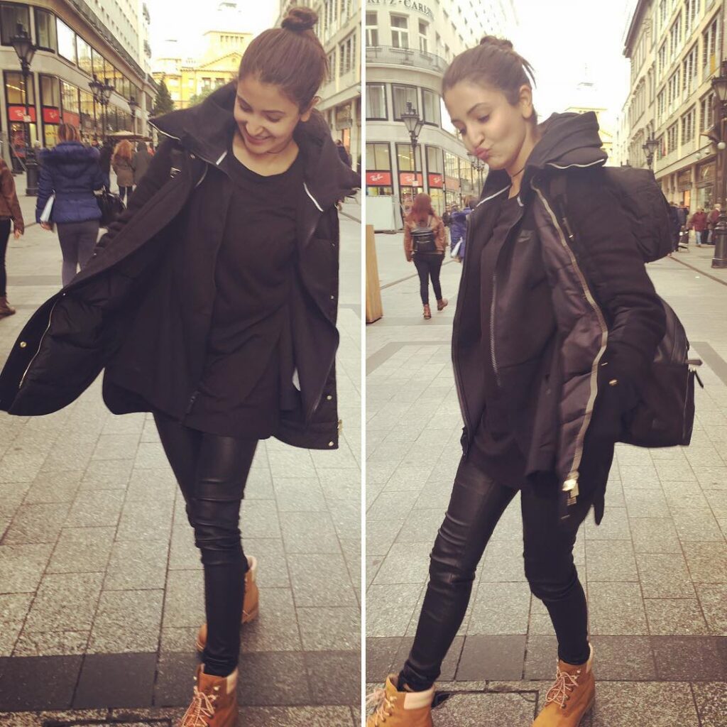 Anushka in all black outfit enjoying her walk on street - Anushka Sharma Latest Hairstyles