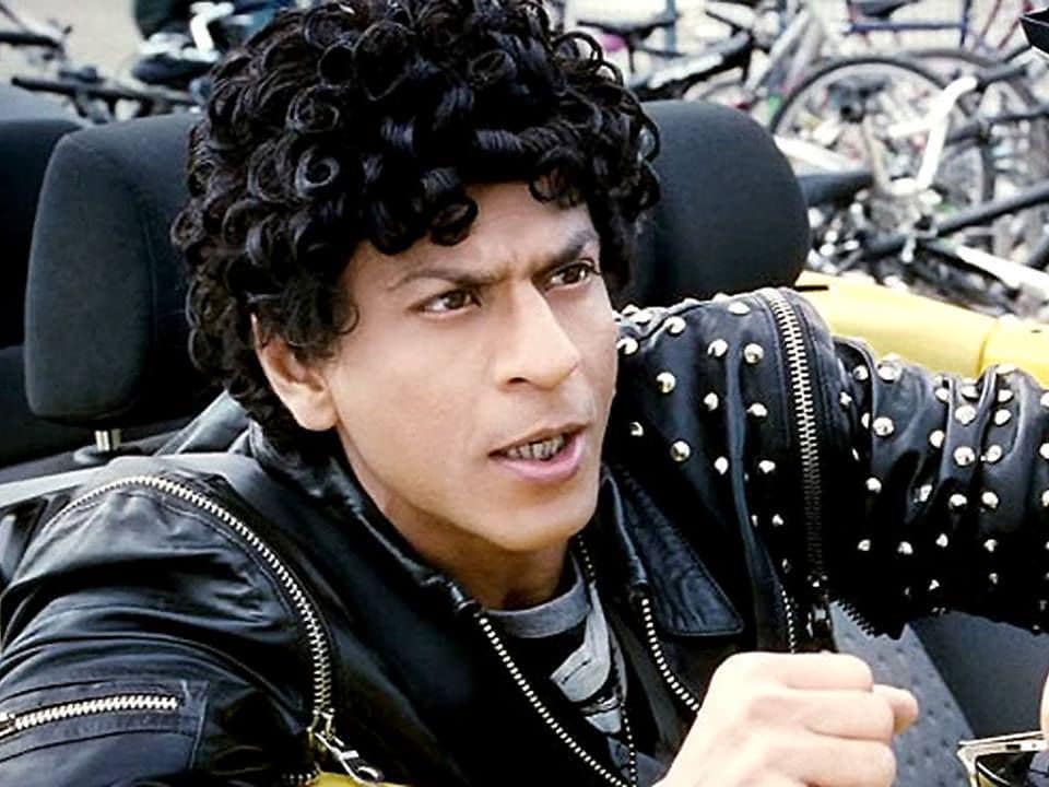 Shahrukh in all black look showing off his  curly hair - shahrukh khan latest hairstyle