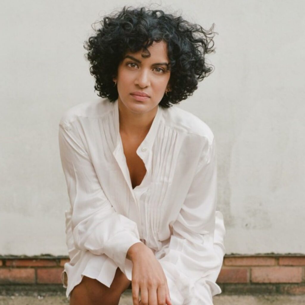 Anoushka Shankar in white shirt dress and curly hair - List of bollywood Actress Who became Pregnant before Marriage