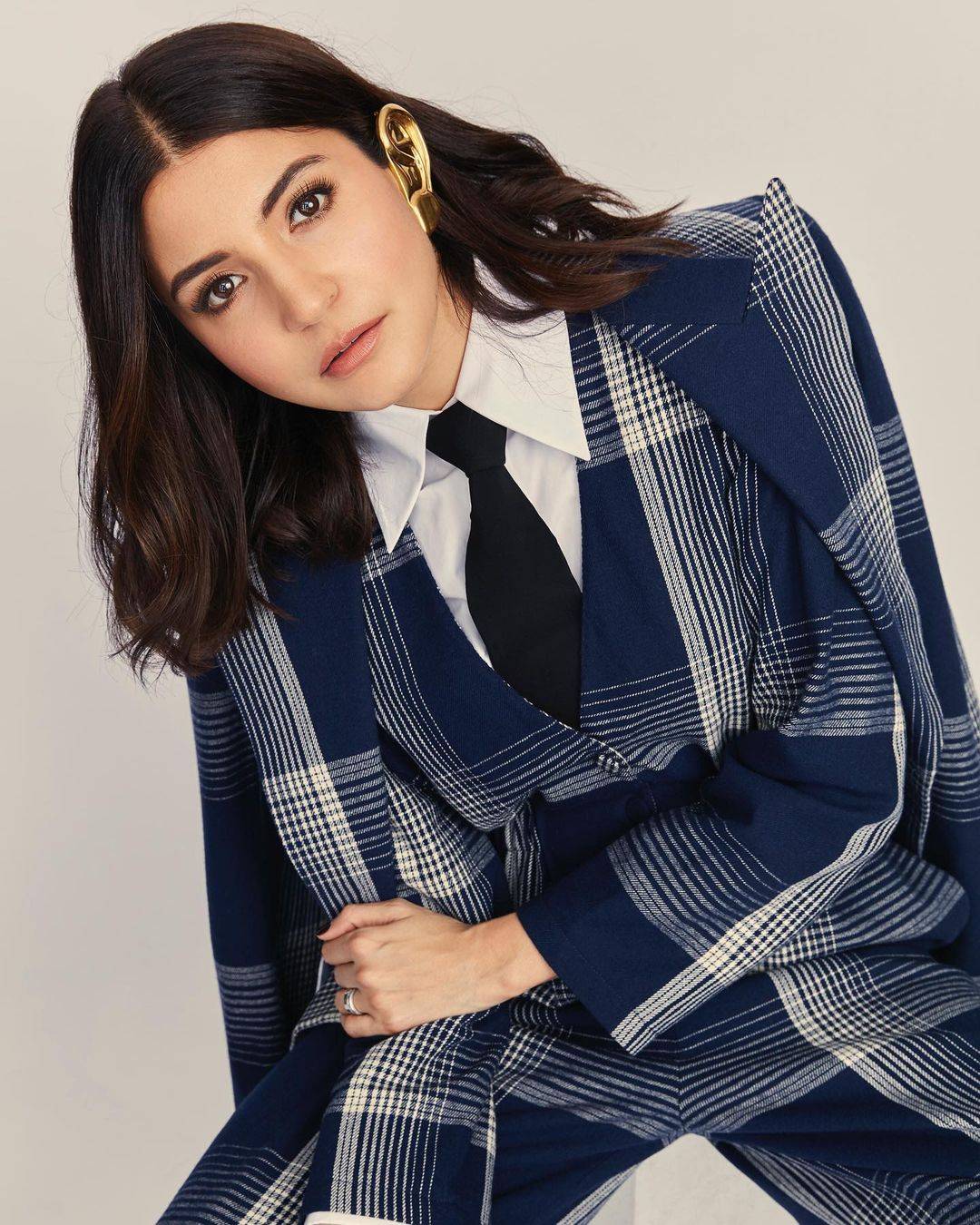 Anushka in blue and white check 3 piece suit - Anushka Sharma Hairstyles name
