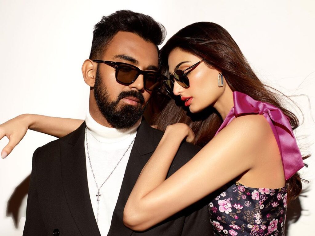 Athiya Shetty and KL Rahul wearing goggles posing for camera - celebrities who made their relationship official in 2021