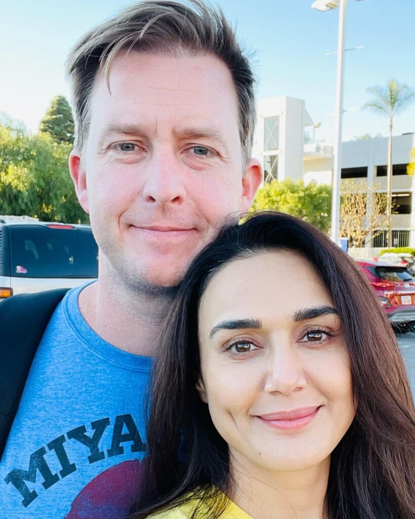 Preity Zinta posing with her husband Gene Goodenough - celebrities who marry late