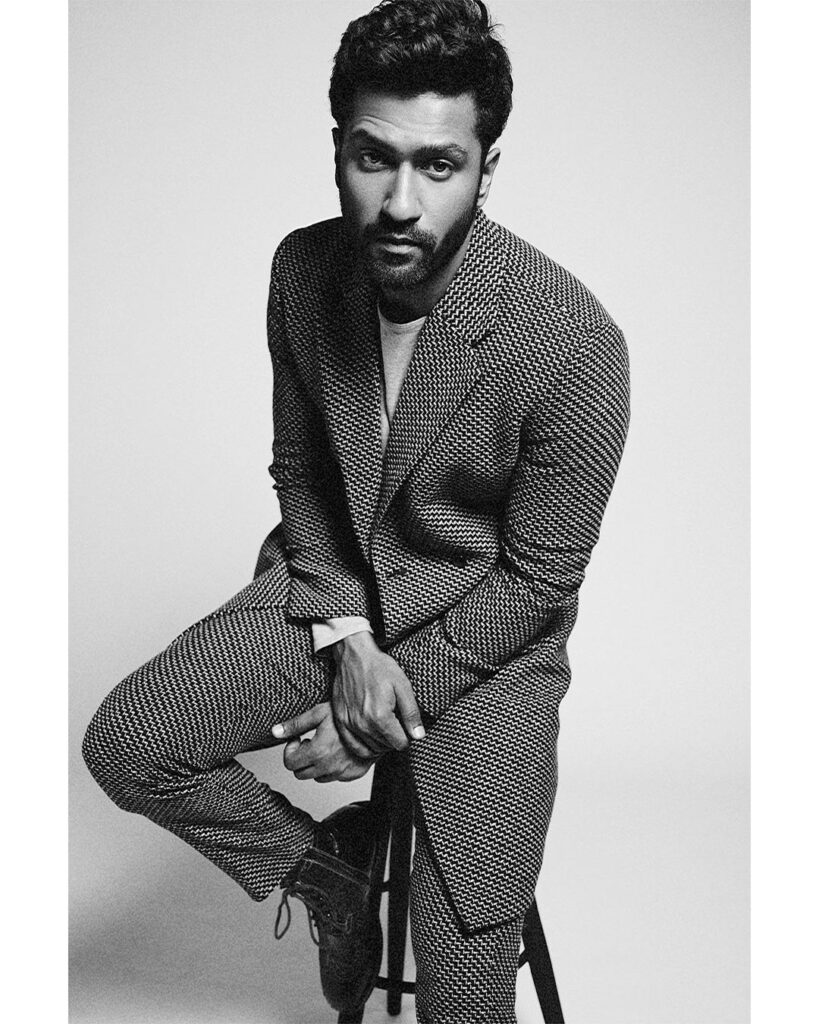 Vickey Kaushal in Black and white textured suit posing for camera in rajputana edge with clean shave - Vicky Kaushal short hairstyle 2021