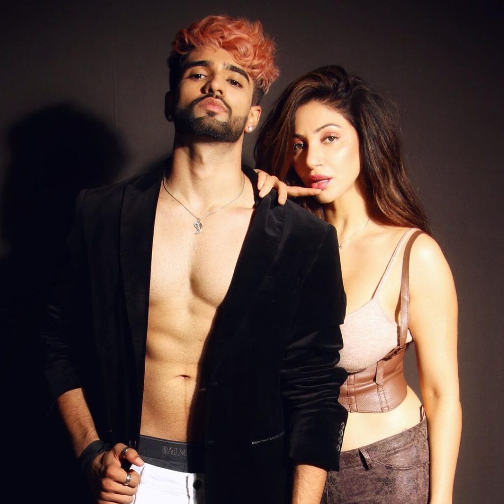 Shirtless Zeeshan Khan with blazer  & Reyhna Pandit posing for camera - Indian celebrity couple 2021
