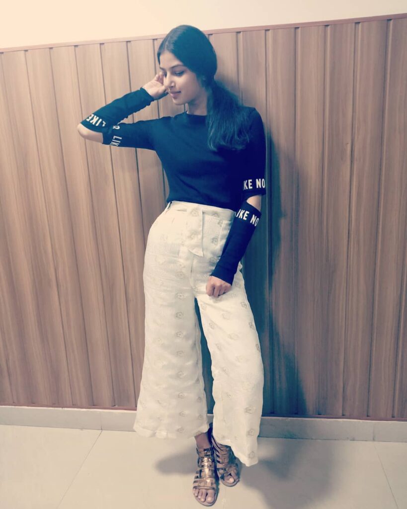 Harnaaz Sandhu in black top and off-white pants - Harnaaz Sandhu no makeup photos