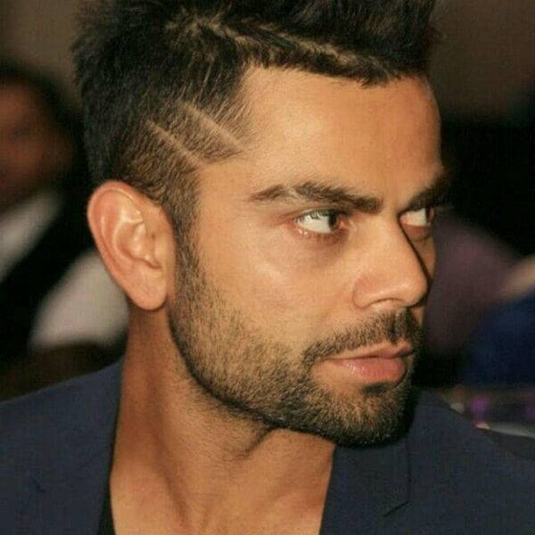 Virat Kohli giving side pose and showing his Spiked hair with side design hairstyle - Virat Kohli Latest hairstyle