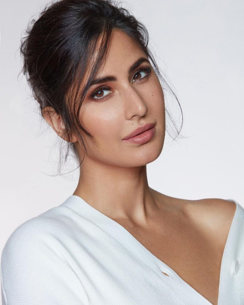 Katrina Kaif in white top and Bun with bangs - celebrity hairstylist