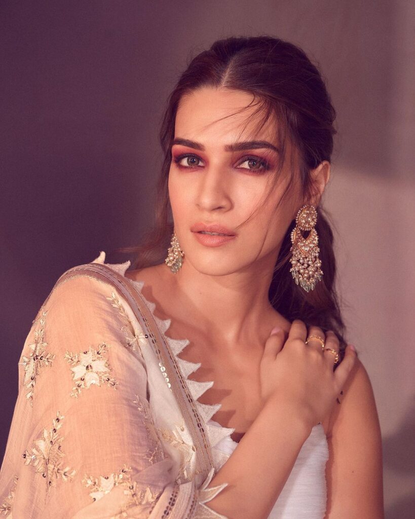 Kriti Sanon in traditional Lehenga and showing her Center Parting Low Ponytail - kriti Sanon hairstyles