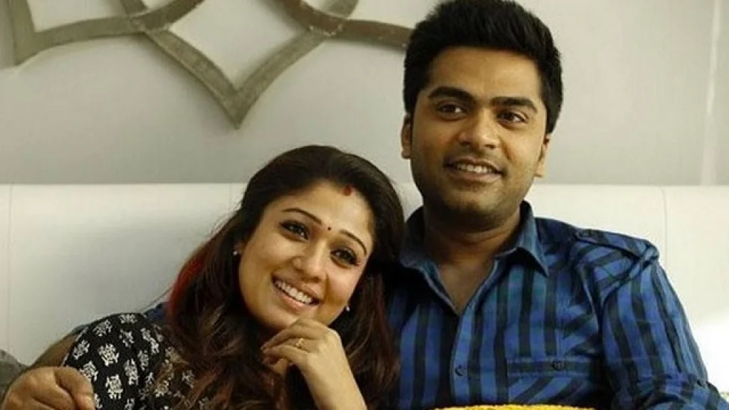 Silambarasan in blue lining shirt and Nayanthara in black kurta posing for camera -  live in relationship