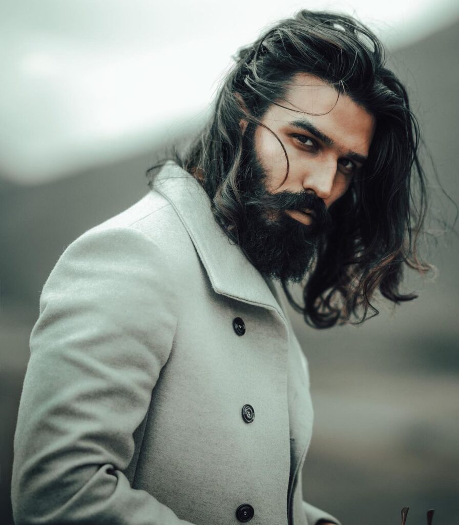 Nitin Chauhan posing for camera in grey overcoat - indian models
