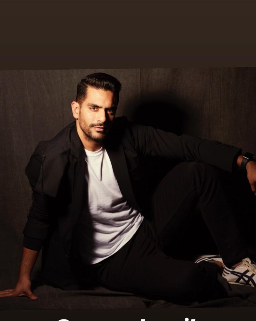 Angad Bedi posing in black suit with white t-shirt - Indian models