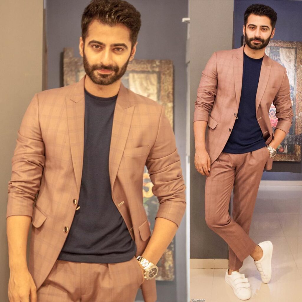 Harshad Arora posing for camera in peach suit with blue inner - male  models in India 2022