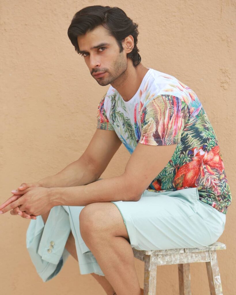 Gaurav Arora in multicolor printed t-shirt with white half pants - male models in India