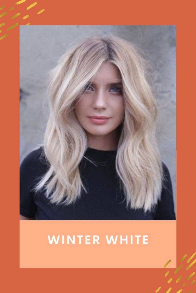 A girl in black top showing her Winter White hair color - hair care routine