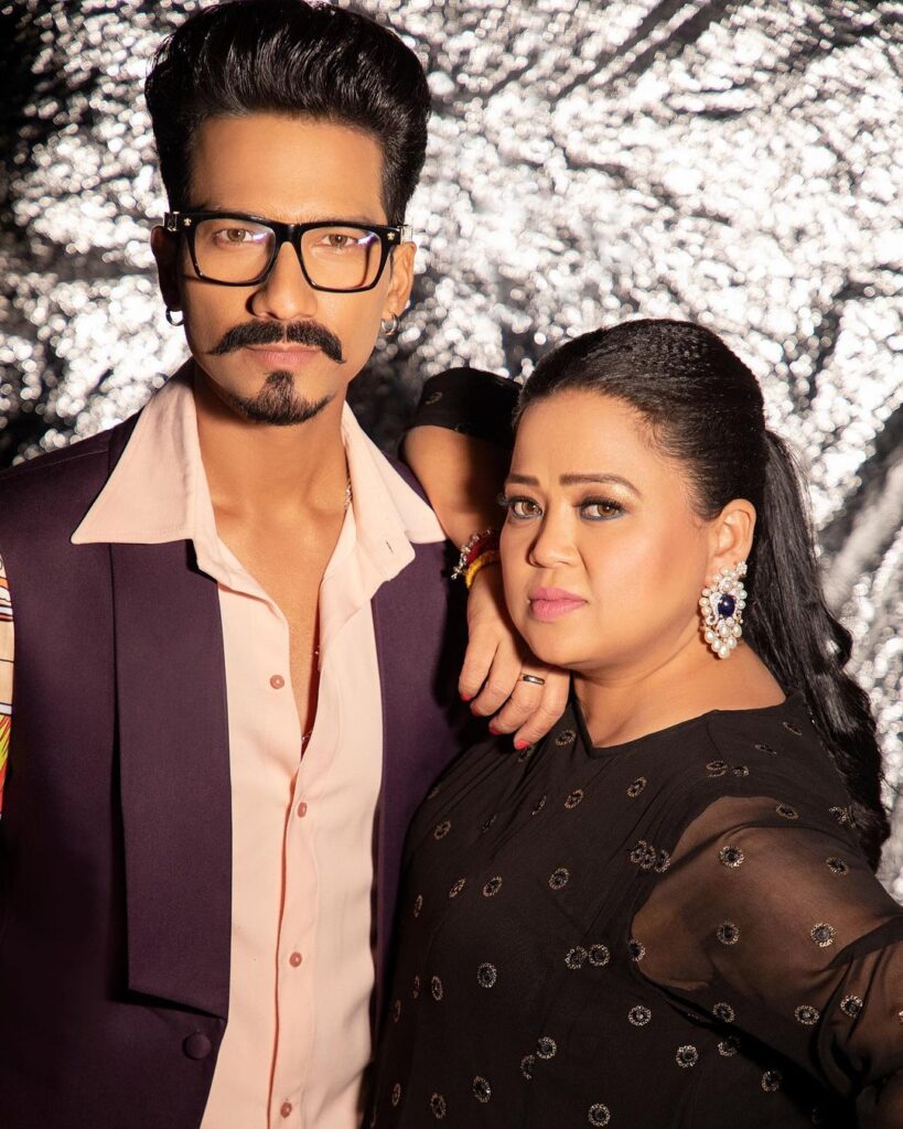 Bharti Singh in black dress and Haarsh Limbachiyaa in purple coat with peach shirt - list of celebrity couple age gap