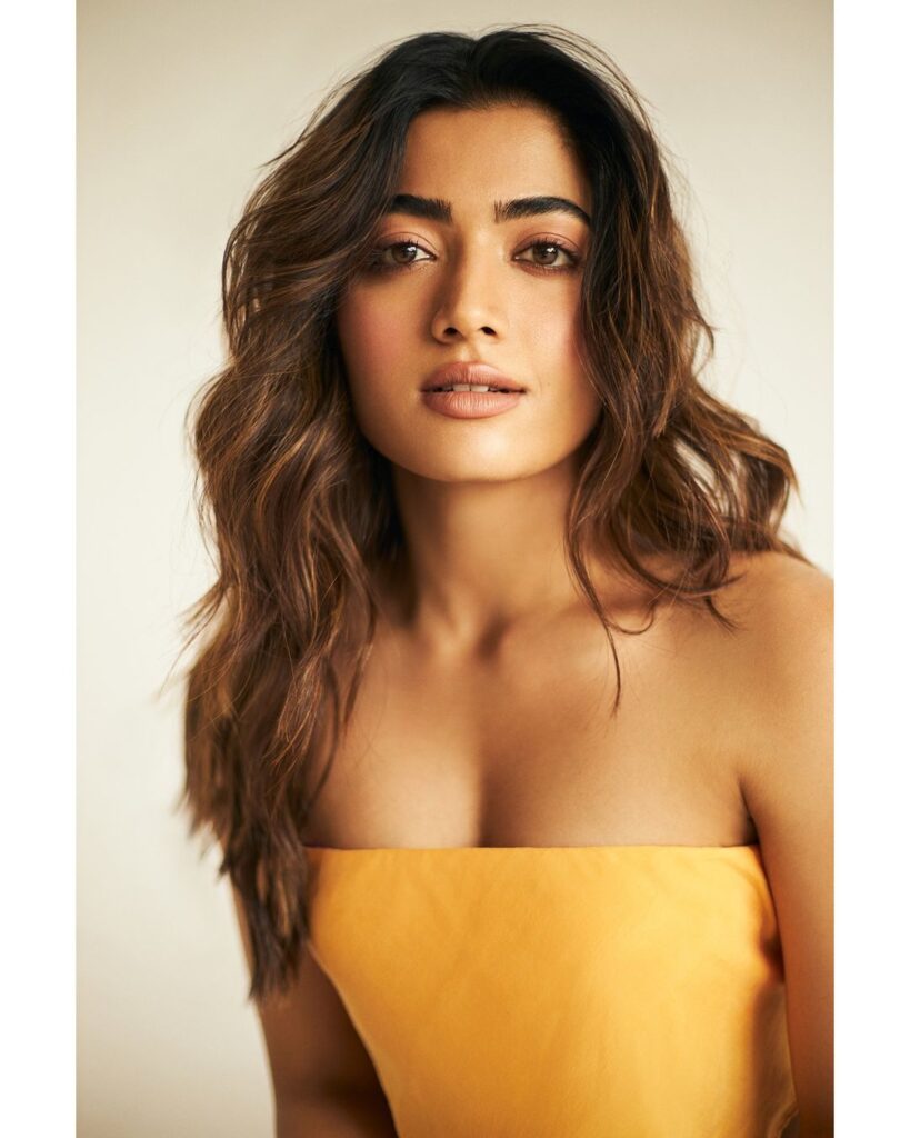 Rashmika Mandanna in yellow off-shoulder dress and curly hair - Rashmika Mandanna hairstyle