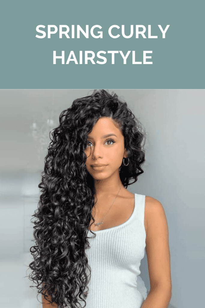A girl in white tank top and Spring curly hairstyle - hairstyle for curly hair