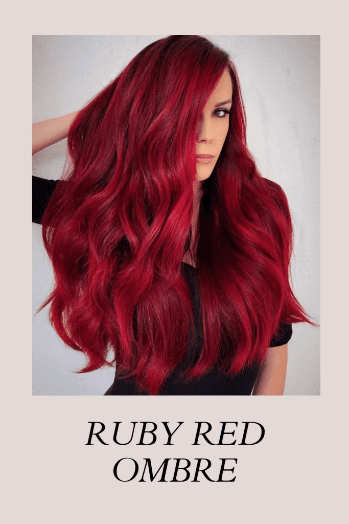 A girl in black top flaunting her Ruby Red Ombre hair color - long hair