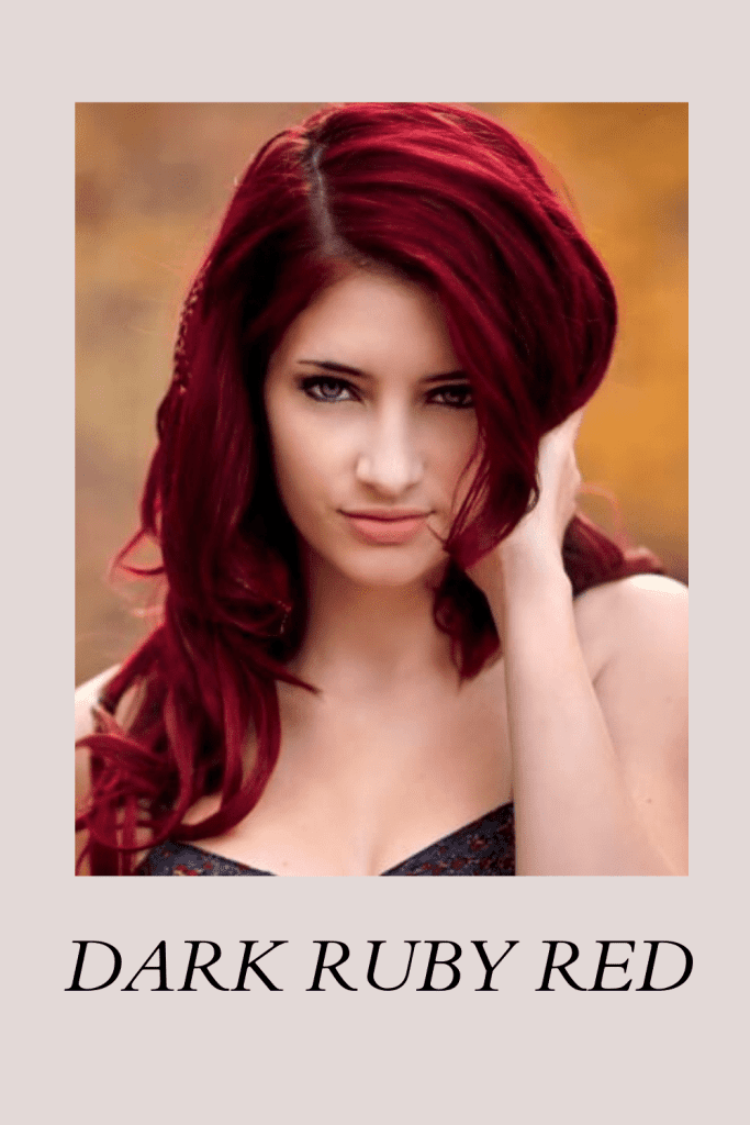 A girl in black off shoulder dress showing her Dark Ruby Red hair color - skin tone