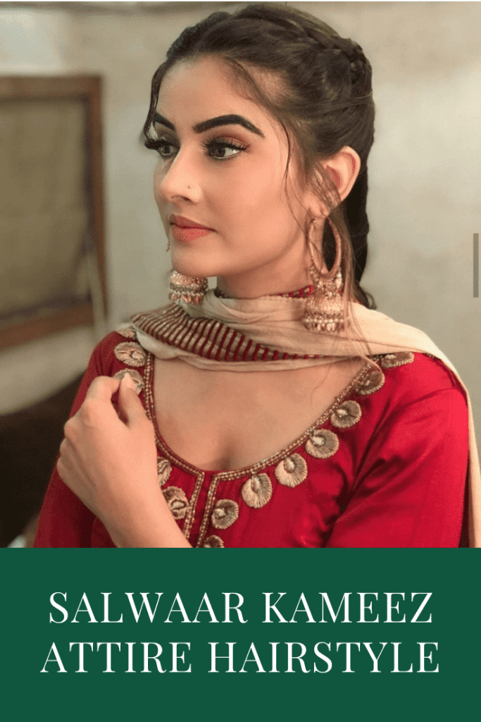 A girl in red suit and hoops earrings showing her braided hairstyle - hare care regime