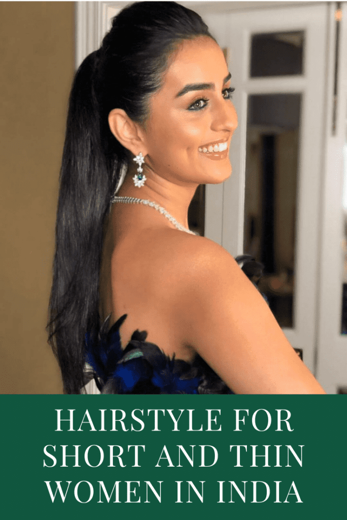A smiling women in blue tube dress giving the side look of her high ponytail - Professional Hairstyles