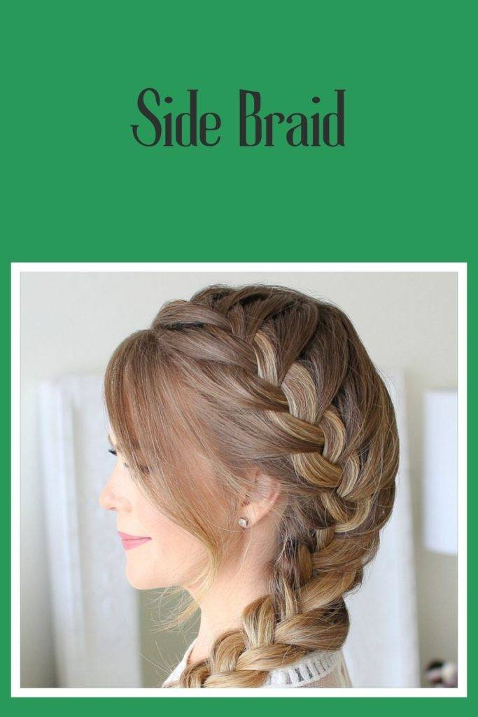 A smiling girl giving a side pose and showing her side braid - 30s women hairstyles for long hair
